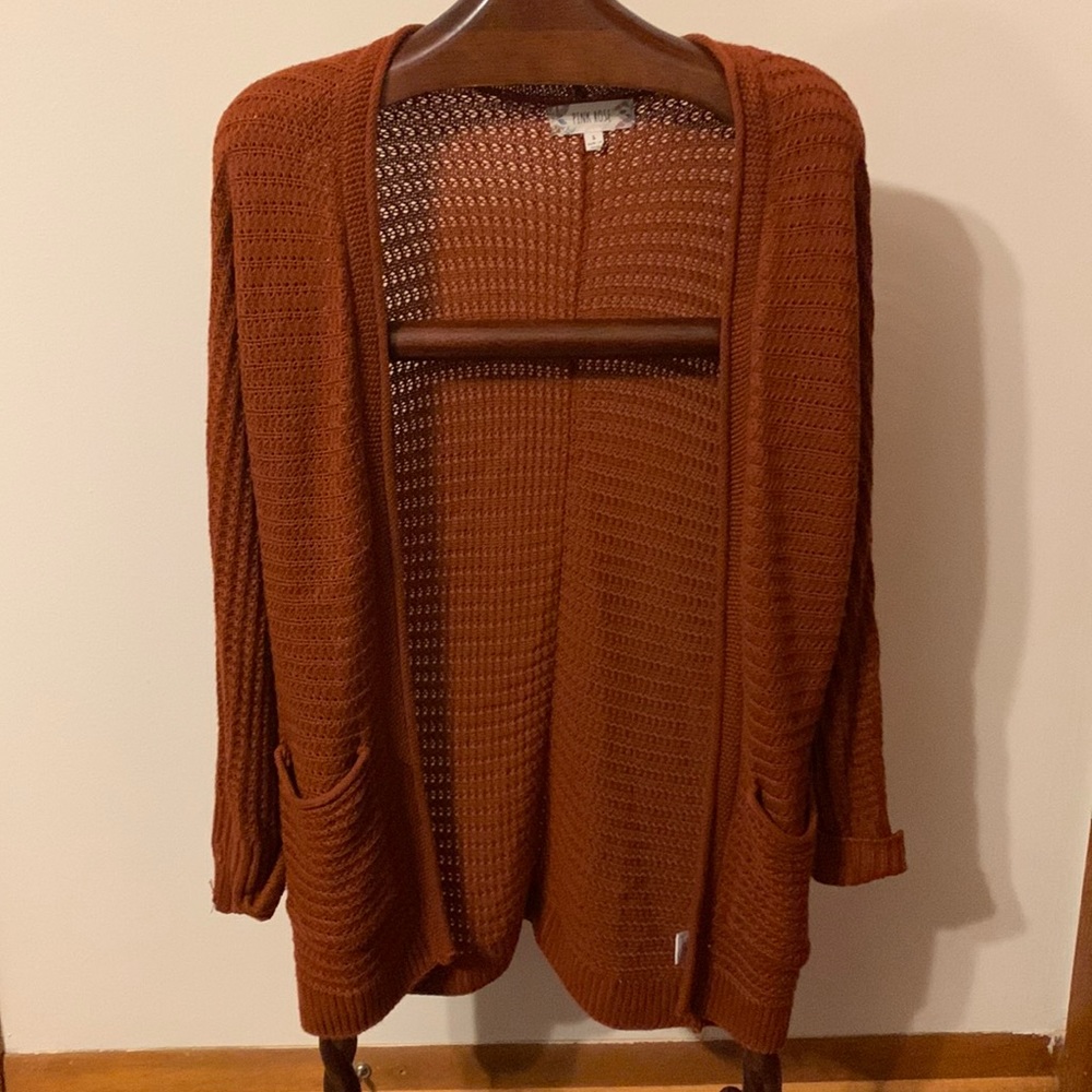 Beautiful, burnt orange cardigan.
